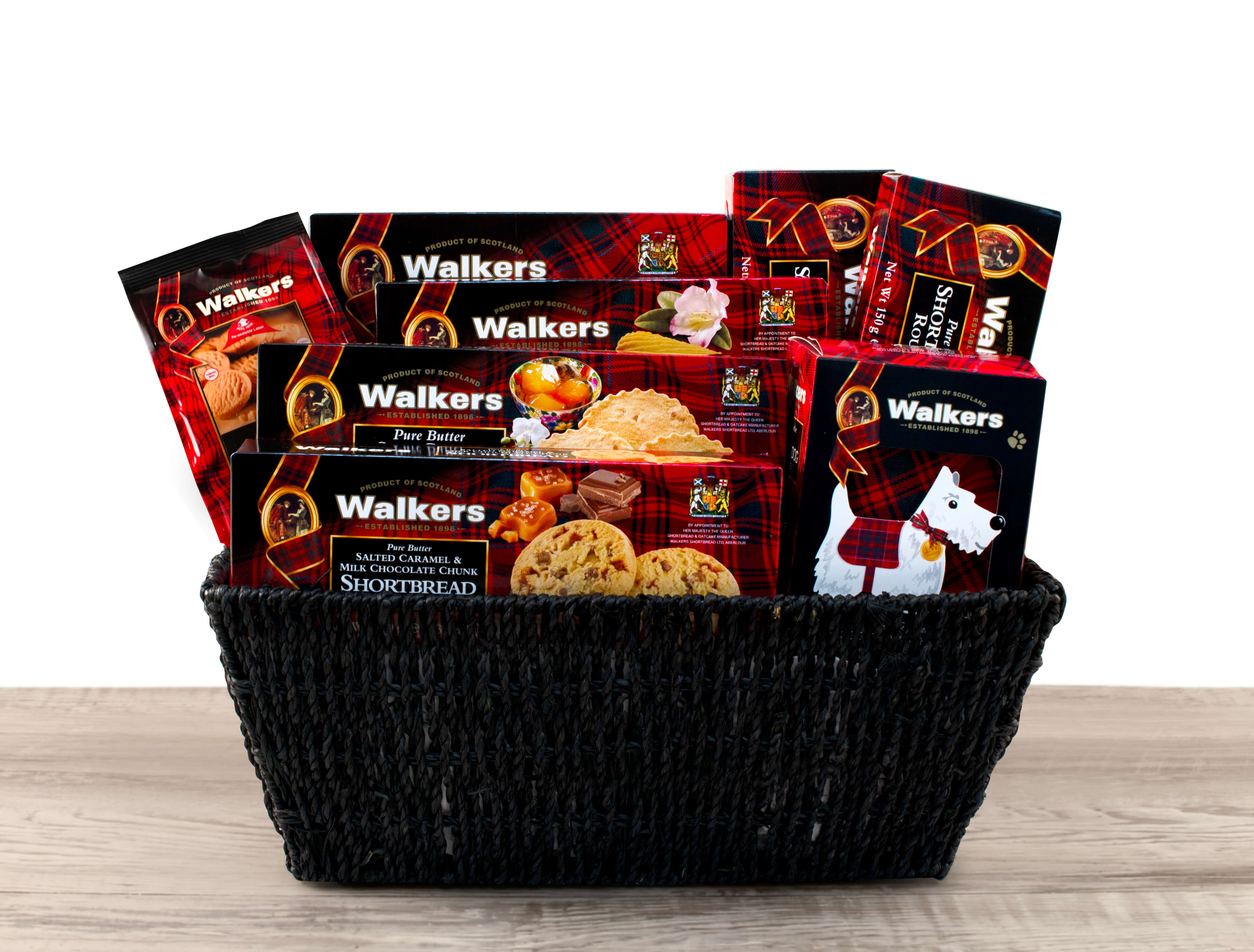 A basket full of various Walker's Shortbread product boxes